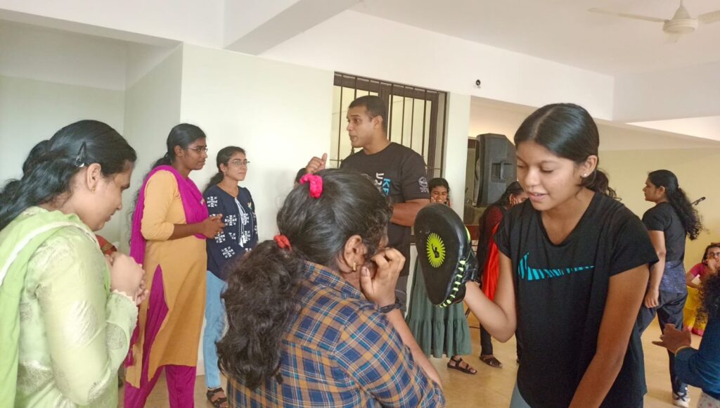 Mr. Sebastian and his team from Krav Maga training our blind women participants in self defense session.