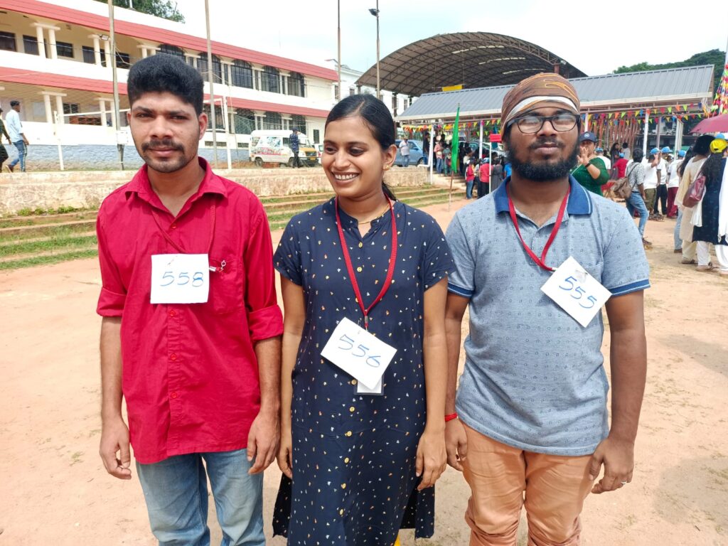 Three of our blind students are getting ready for running with their id number.